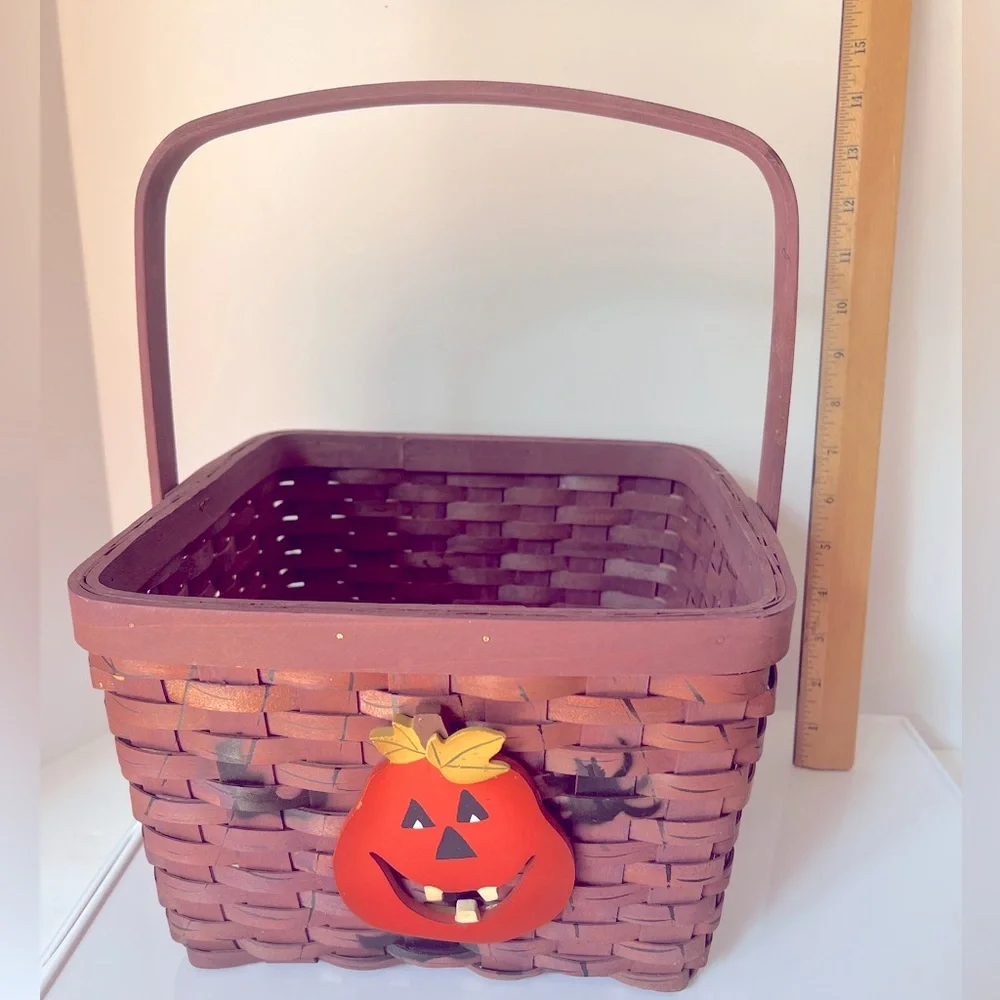 Spooky Purple Halloween Basket with a Pumpkin, Bats, and Spiders on the Sides.